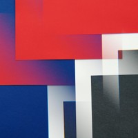 Vibrant abstract design with geometric overlays in red, blue, and black colors.